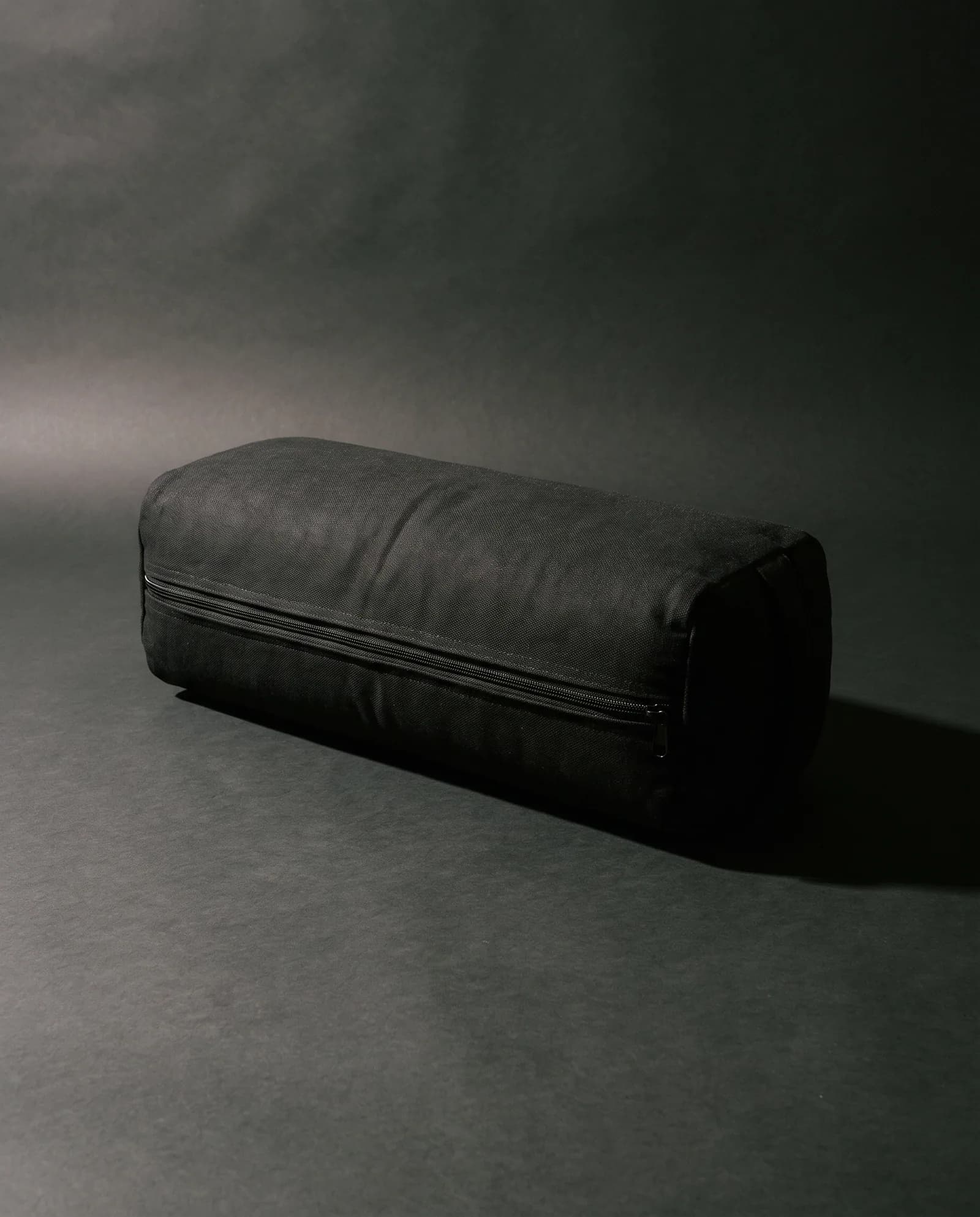 Bolster — Firm rectangular support, washable cover.