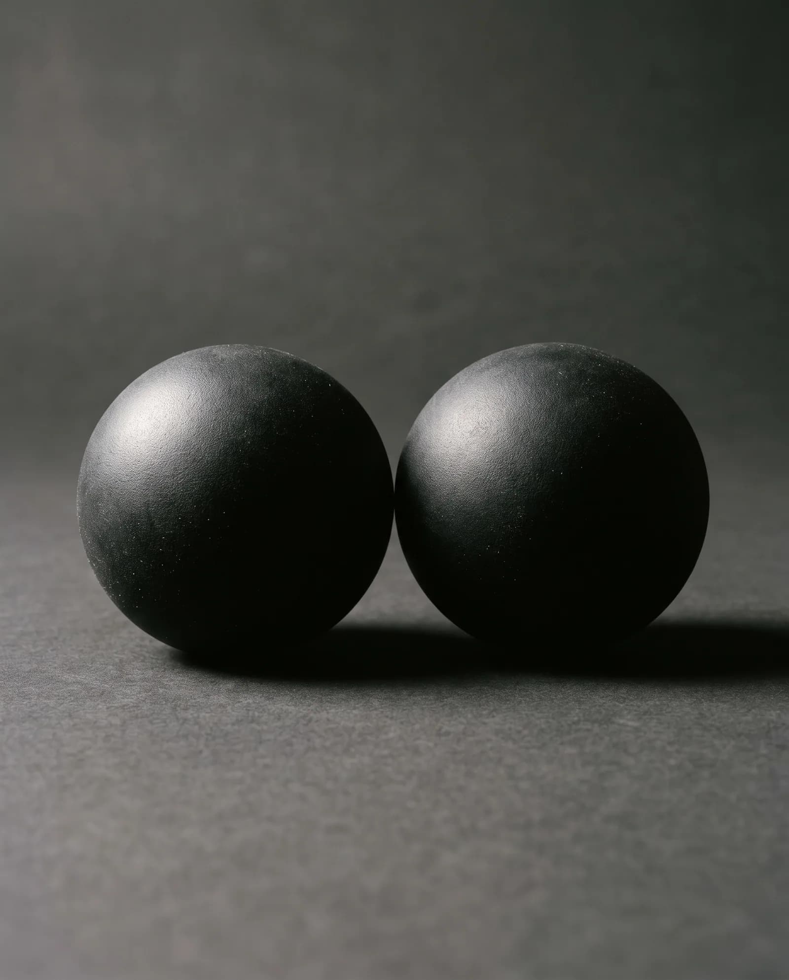 Massage Balls — Pair. Solid rubber, two densities.