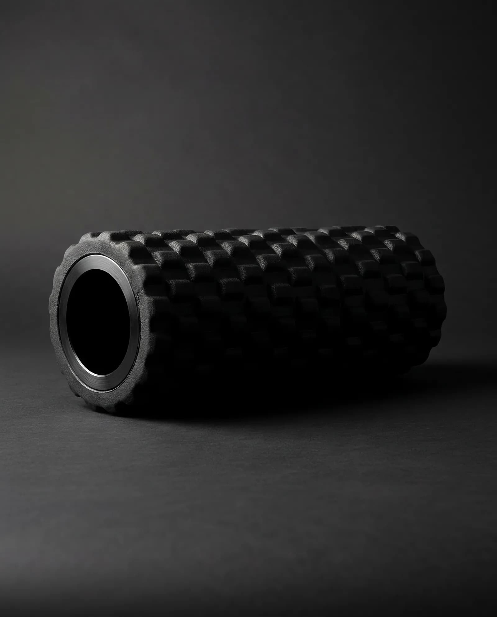 Recovery Roller — Anodised aluminium core, moulded EVA shell.