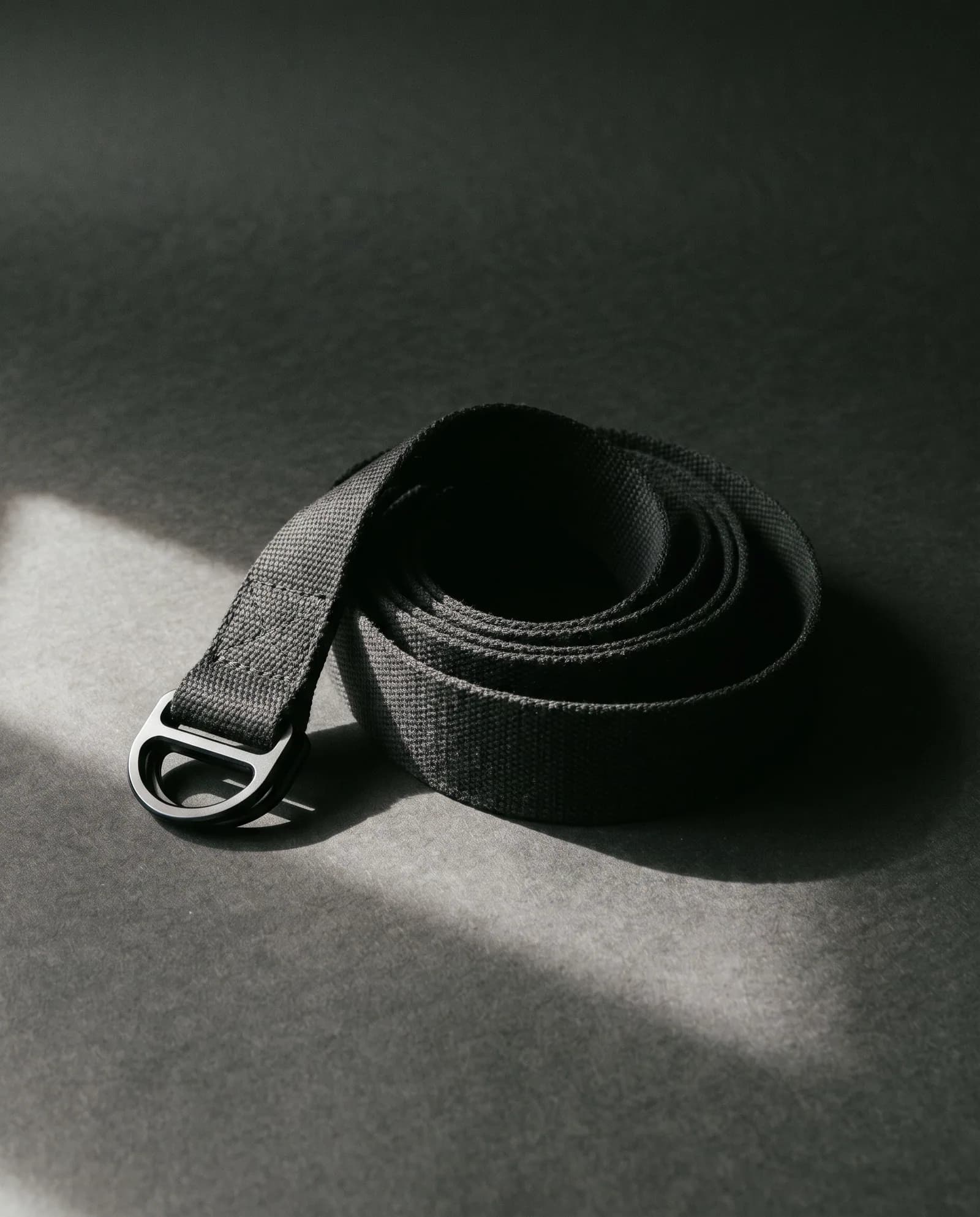 Strap — Cotton webbing, machined aluminium buckle.