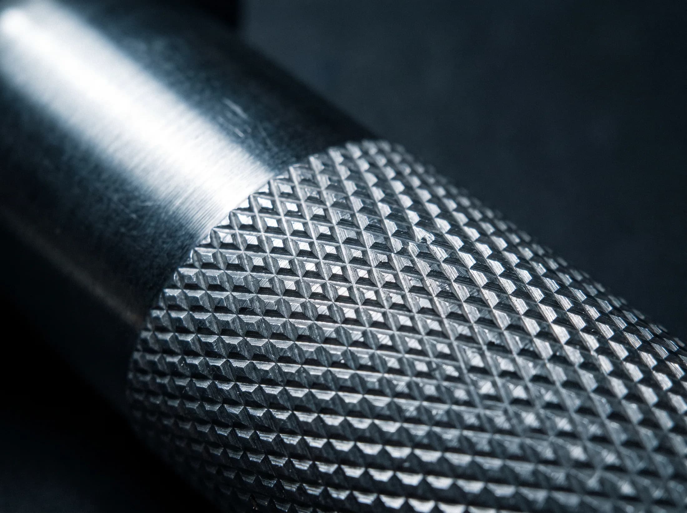Close detail of knurling on a machined stainless steel weight
